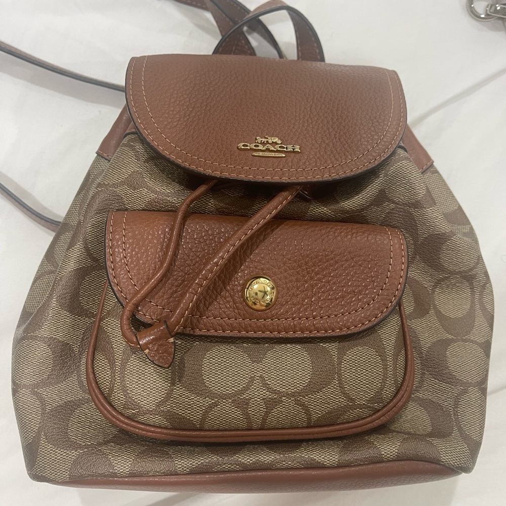 Mini Coach Backpack! Brand new condition. No marks anywhere inside or out.
